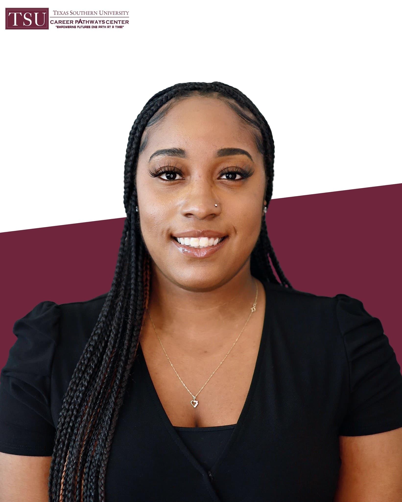 Professional headshot of a woman in a black top